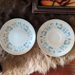 Two vintage 60s Royal China Blue Heaven saucers white & atomic blue